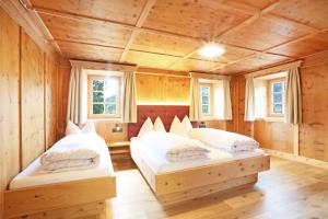 En eller flere senge i et værelse på Hanslerhof