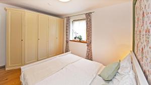 Posteľ alebo postele v izbe v ubytovaní NOCKFLAIR Apartment by Isa Agentur