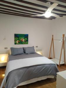 A bed or beds in a room at Patio de la Plata