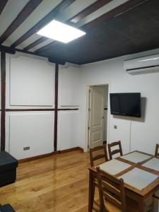 A television and/or entertainment centre at Patio de la Plata