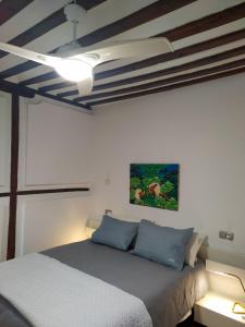 A bed or beds in a room at Patio de la Plata