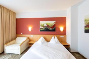 Posteľ alebo postele v izbe v ubytovaní Hotel Bokan Exclusiv