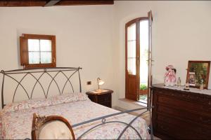 Un pat sau paturi într-o cameră la Sant'Ippolito