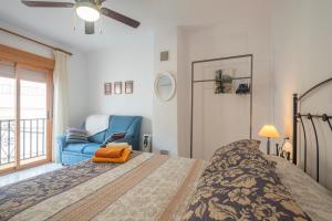 Un pat sau paturi într-o cameră la Casa Río Quentar