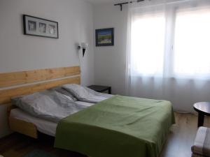Posteľ alebo postele v izbe v ubytovaní Lenart House 1