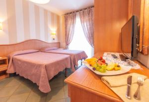 Postel nebo postele na pokoji v ubytování Hotel Kyrton
