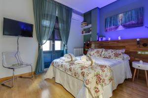 Кровать или кровати в номере Central Quality Apartment Spa Salamanca