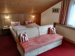 Postel nebo postele na pokoji v ubytování Landhaus Hubert Fiegl