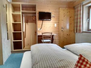 Postel nebo postele na pokoji v ubytování Landhaus Hubert Fiegl