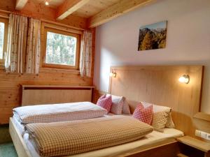 Postel nebo postele na pokoji v ubytování Landhaus Hubert Fiegl