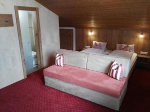 Postel nebo postele na pokoji v ubytování Landhaus Hubert Fiegl