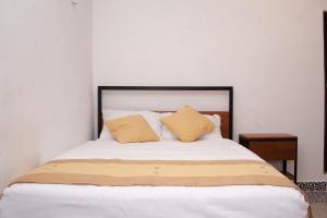 Postel nebo postele na pokoji v ubytování Casa Tulita Valladolid