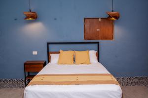 Postel nebo postele na pokoji v ubytování Casa Tulita Valladolid