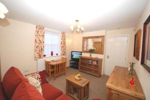 Μια τηλεόραση ή/και κέντρο ψυχαγωγίας στο Saltburn Holidays Bluebell Cottage