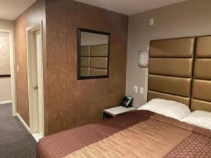 Postel nebo postele na pokoji v ubytování Hotel Key