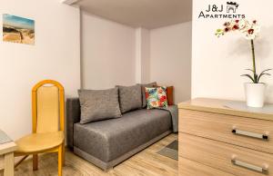 Posedenie v ubytovaní J&J Apartments, Łazienna 30 Apartament 8/1