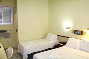 Llit o llits en una habitació de Panorama Hotel