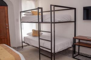 Postel nebo postele na pokoji v ubytování Casa Tulita Valladolid