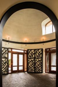 an archway in a building with doors and windows at Hotel Valencia Santana Row in San Jose