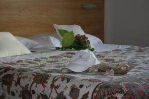 Postel nebo postele na pokoji v ubytování B&B Ortensia