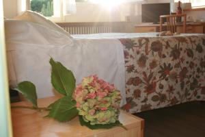 Postel nebo postele na pokoji v ubytování B&B Ortensia