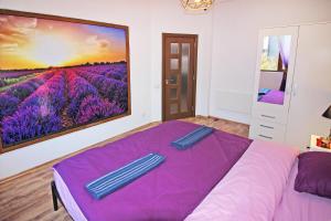 A bed or beds in a room at Top Center Relax, NDK & Vitosha str, FREE Secured parking