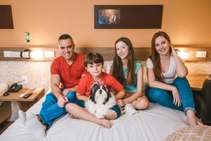 Rodina v ubytování Hotel 10 Blumenau