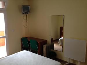 TV a/nebo společenská místnost v ubytování Albergue De Puntas De Calnegre