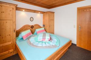 Ein Bett oder Betten in einem Zimmer der Unterkunft MH Appartement Bartolot