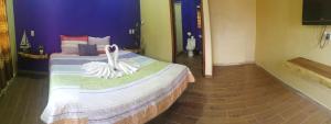 Postel nebo postele na pokoji v ubytování Playa Sayulita