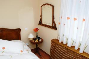 A bed or beds in a room at Casa Monica