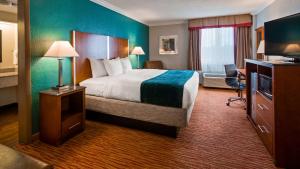 Ένα ή περισσότερα κρεβάτια σε δωμάτιο στο Best Western Ft Lauderdale I-95 Inn