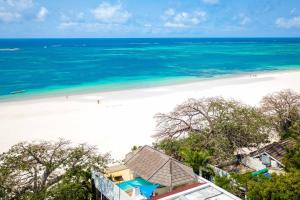 A bird's-eye view of Tequila Sunrise Forest Cabana - on Diani Beach