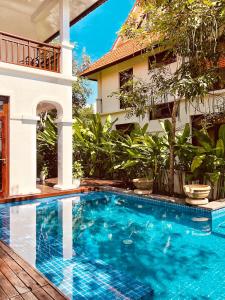 Hồ bơi trong/gần Charming 4 Bedrooms Villas with few step to beach