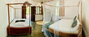 Voodi või voodid majutusasutuse Lazy Beach House toas
