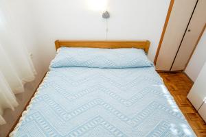 Postel nebo postele na pokoji v ubytování Holiday Home Maddalena