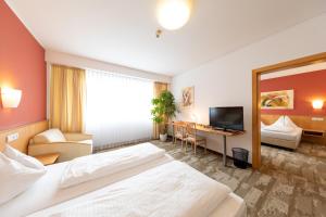 Posteľ alebo postele v izbe v ubytovaní Hotel Bokan Exclusiv