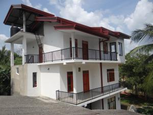 Balkón nebo terasa v ubytování Kumudu Holiday Home
