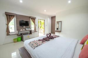 TV a/nebo společenská místnost v ubytování Khum Maikaew Resort