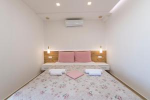 Posteľ alebo postele v izbe v ubytovaní Apartment Roso