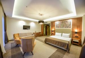 Posteľ alebo postele v izbe v ubytovaní Hotel Lazaro