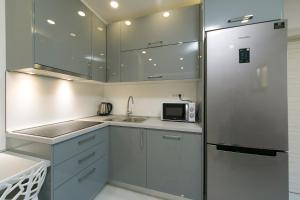 Kuchyňa alebo kuchynka v ubytovaní Apartment Roso