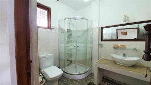 Een badkamer bij Dhammika Magic Palace