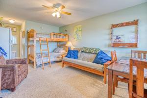 a living room with a bunk bed and a couch at Moosehead Condo Unit #5 in Rockwood