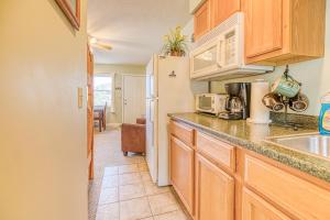 a kitchen with a sink and a refrigerator at Moosehead Condo Unit #5 in Rockwood