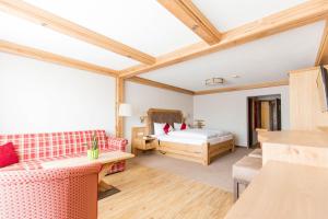 Postel nebo postele na pokoji v ubytování Hotel Gerbe