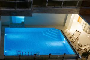 Bazén v ubytování Grand TheoNi Boutique Hotel & Spa nebo v jeho okolí