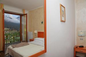 Ein Bett oder Betten in einem Zimmer der Unterkunft Club Hotel Costaverde