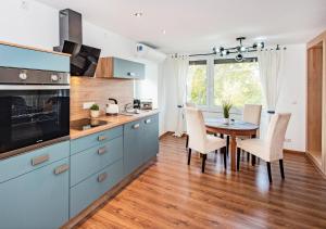 Kuchyň nebo kuchyňský kout v ubytování Ferienhaus Ingrid