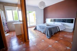 Posteľ alebo postele v izbe v ubytovaní Chalet Benidorm
